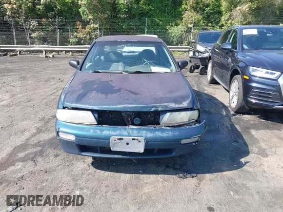 ✅ 1997 Nissan Altima XE • VIN: 1N4BU31D1VC199720 • Lot: 42061192. Listed on IAAI with 312,370 mi. Free auction sales archive from the USA and detailed vehicle history report at DreamBid. Image 12.