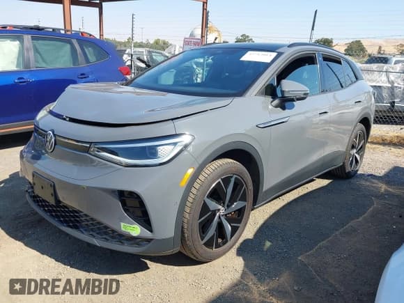 ✅ 2023 Volkswagen ID.4 Pro S • VIN: 1V2WNPE84PC026742 • Lot: 42712014. Listed on IAAI with 27,887 mi. Free auction sales archive from the USA and detailed vehicle history report at DreamBid. Image 2.