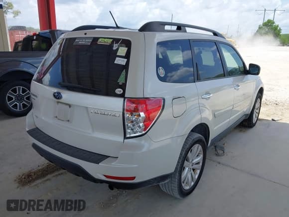✅ 2012 Subaru Forester X Premium • VIN: JF2SHBDC3CH424796 • Lot: 42425913. Listed on IAAI with 156,848 mi. Free auction sales archive from the USA and detailed vehicle history report at DreamBid. Image 4.