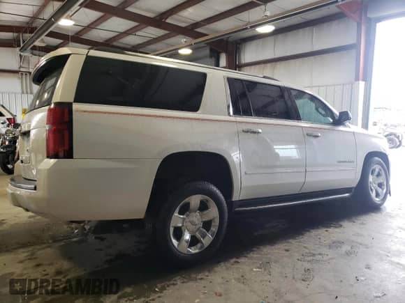 2020 Chevrolet Suburban Premier z VIN 1GNSKJKC5LR174248, wystawiony jako Copart lot #73365664 z przebiegiem 124 755 mil mil oraz Szkoda całkowita • Salvage title. Historia ofert i sprzedaży dostępna na DreamBid. Obrazek 3.