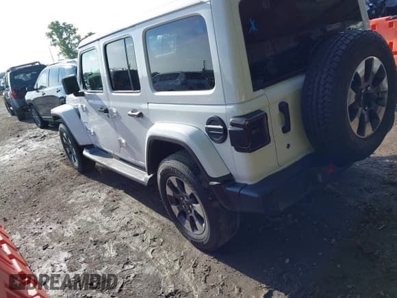 ✅ 2018 Jeep Wrangler Unlimited Sahara • VIN: 1C4HJXEG0JW321355 • Lot: 42343112. Listed on IAAI with 102,457 mi. Free auction sales archive from the USA and detailed vehicle history report at DreamBid. Image 3.