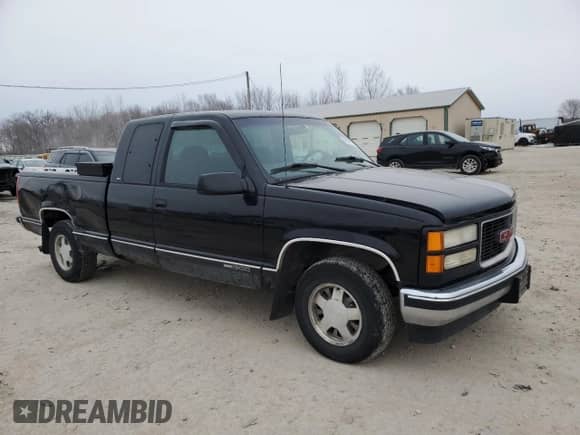 ✅ 1997 GMC Sierra 1500 • VIN: 1GTEC19M0VE552763 • Lot: 46078505. Listed on Copart with 151,561 mi miles. Access the free auction sales archive from the USA and view a detailed vehicle history report at DreamBid. Image 4.