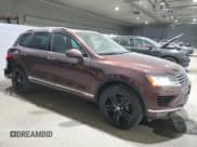 ✅ 2017 Volkswagen Touareg Wolfsburg Edition • VIN: WVGRF7BPXHD003559 • Lot: 41532925. Listed on Copart with 117,801 mi. Free auction sales archive from the USA and detailed vehicle history report at DreamBid. Image 4.