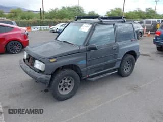 ✅ 1995 Geo Tracker • VIN: 2CNBJ1866S6903070 • Лот: 42756444. Опубликован ранее на IAAI с пробегом 99 427 миль. Бесплатный доступ к архиву аукционных продаж из США и подробный отчёт об истории автомобиля на DreamBid. Изображение 2.