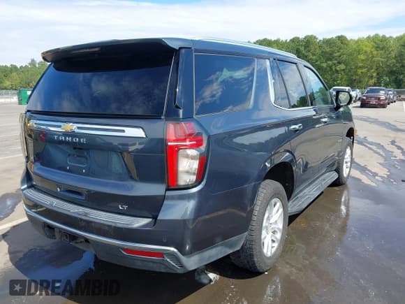 ✅ 2021 Chevrolet Tahoe LT • VIN: 1GNSKNKD4MR271166 • Lot: 43227233. Listed on IAAI with 128,404 mi. Free auction sales archive from the USA and detailed vehicle history report at DreamBid. Image 4.