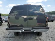 ✅ 1996 GMC Suburban • VIN: 3GKEC16R1TG516669 • Lot: 69262744. Listed on Copart with Not provided. Free auction sales archive from the USA and detailed vehicle history report at DreamBid. Image 6.