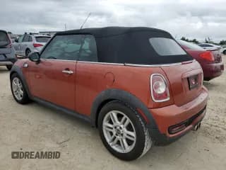 ✅ 2014 MINI Convertible S • VIN: WMWZP3C51ET707557 • Лот: 74566644. Опубликован ранее на Copart с пробегом 58 628 миль. Бесплатный доступ к архиву аукционных продаж из США и подробный отчёт об истории автомобиля на DreamBid. Изображение 2.