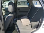 ✅ 2010 Ford Escape XLS • VIN: 1FMCU9C73AKB18401 • Lot: 80666015. Listed on Copart with 129,587 mi. Free auction sales archive from the USA and detailed vehicle history report at DreamBid. Image 11.