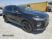 ✅ 2019 Hyundai Santa Fe Limited • VIN: 5NMS53AAXKH035442 • Lot: 57291753. Listed on Copart with 68,672 mi. Free auction sales archive from the USA and detailed vehicle history report at DreamBid. Image 4.