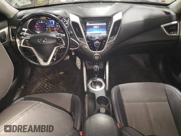 ✅ 2013 Hyundai Veloster RE:MIX • VIN: KMHTC6AD0DU178185 • Лот: 47559025. Размещён на Copart с пробегом 134 754 миль миль. Получите бесплатный доступ к архиву аукционных продаж из США и посмотрите подробный отчёт об истории автомобиля на DreamBid. Изображение 8.