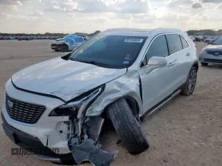 ✅ 2022 Cadillac XT4 FWD Premium Luxury • VIN: 1GYFZCR40NF105398 • Lot: 85189695. Listed on Copart with 79,530 mi. Free auction sales archive from the USA and detailed vehicle history report at DreamBid. Image 1.