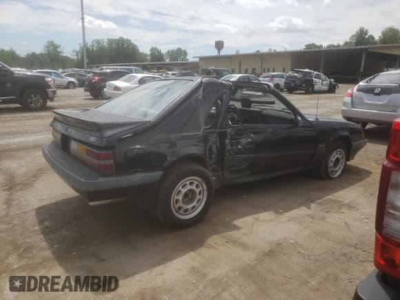 ✅ 1985 Ford Mustang GT • VIN: 1FABP28M1FF141243 • Lot: 62419164. Listed on Copart with 93,880 mi. Free auction sales archive from the USA and detailed vehicle history report at DreamBid. Image 3.