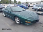 ✅ 1997 Pontiac Firebird Firebird • VIN: 2G2FS22KXV2205785 • Lot: 43343342. Listed on IAAI with 58,624 mi. Free auction sales archive from the USA and detailed vehicle history report at DreamBid. Image 1.