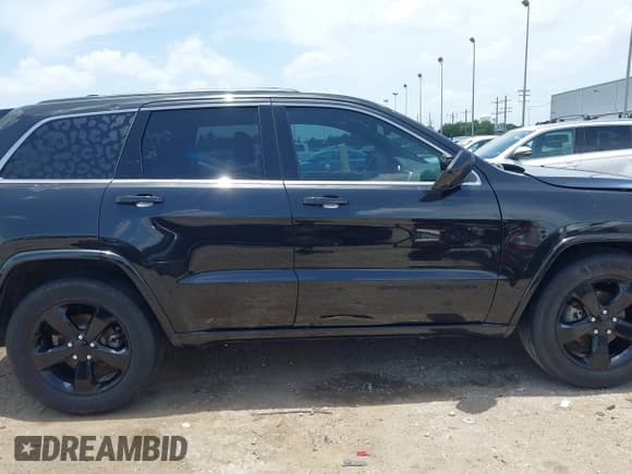 ✅ 2015 Jeep Grand Cherokee Altitude • VIN: 1C4RJEAG1FC143866 • Lot: 42538204. Listed on IAAI with 215,713 mi. Free auction sales archive from the USA and detailed vehicle history report at DreamBid. Image 13.