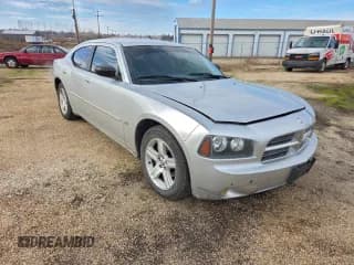 ✅ 2009 Dodge Charger SXT • VIN: 2B3KA33V89H508502 • Lot: 95903185. Listed on Copart with 213,779 mi. Free auction sales archive from the USA and detailed vehicle history report at DreamBid. Image 1.