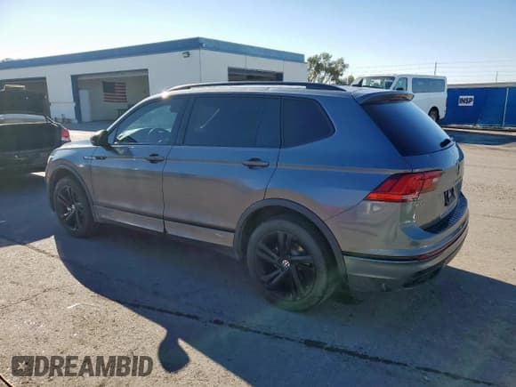 ✅ 2023 Volkswagen Tiguan SE R-Line Black • VIN: 3VVCB7AX7PM065464 • Лот: 71364395. Опубликован ранее на Copart с пробегом 20 505 миль. Бесплатный доступ к архиву аукционных продаж из США и подробный отчёт об истории автомобиля на DreamBid. Изображение 2.