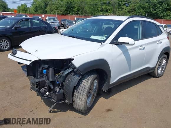 2021 Hyundai Kona SEL z VIN KM8K2CAA9MU615281, wystawiony jako IAAI lot #42403332 z przebiegiem 57 206 mil mil oraz . Historia ofert i sprzedaży dostępna na DreamBid. Obrazek 6.
