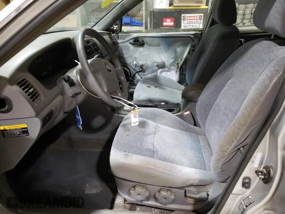 ✅ 2005 Kia Optima LX • VIN: KNAGD126755418217 • Lot: 80759744. Listed on Copart with 79,060 mi. Free auction sales archive from the USA and detailed vehicle history report at DreamBid. Image 7.