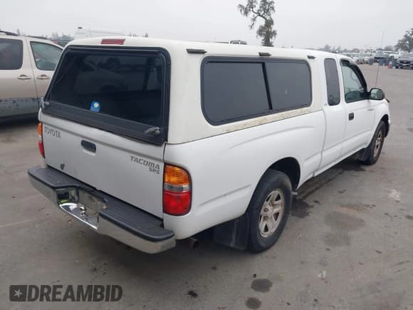 ✅ 2003 Toyota Tacoma • VIN: 5TEVL52N13Z240049 • Lot: 43852918. Listed on IAAI with 434,894 mi. Free auction sales archive from the USA and detailed vehicle history report at DreamBid. Image 4.