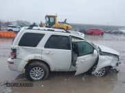 ✅ 2010 Mercury Mariner Premier • VIN: 4M2CN9HG8AKJ09679 • Lot: 41472049. Listed on IAAI with 99,554 mi. Free auction sales archive from the USA and detailed vehicle history report at DreamBid. Image 12.