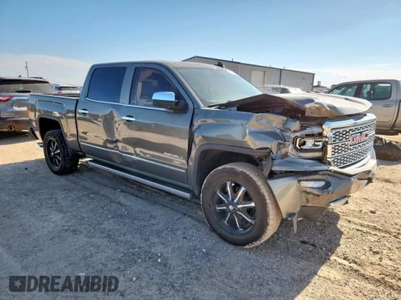 ✅ 2018 GMC Sierra 1500 Denali • VIN: 3GTU2PEC5JG534339 • Лот: 61026465. Опубликован ранее на Copart с пробегом 74 083 миль. Бесплатный доступ к архиву аукционных продаж из США и подробный отчёт об истории автомобиля на DreamBid. Изображение 4.