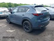 ✅ 2023 Mazda CX-5 S Carbon Edition • VIN: JM3KFBCM8P0223695 • Lot: 42379352. Listed on IAAI with 41,849 mi. Free auction sales archive from the USA and detailed vehicle history report at DreamBid. Image 3.