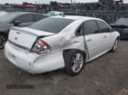 ✅ 2014 Chevrolet Impala LTZ • VIN: 2G1WC5E33E1167345 • Lot: 43548449. Listed on IAAI with 222,330 mi. Free auction sales archive from the USA and detailed vehicle history report at DreamBid. Image 4.