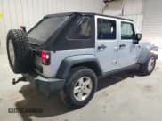 ✅ 2008 Jeep Wrangler Unlimited Rubicon • VIN: 1J4GA69128L590958 • Lot: 54013755. Listed on Copart with 146,997 mi. Free auction sales archive from the USA and detailed vehicle history report at DreamBid. Image 3.