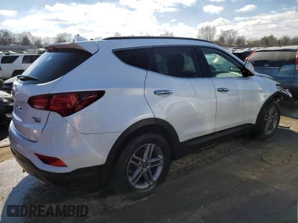✅ 2018 Hyundai Santa Fe 2.4L • VIN: 5NMZUDLB8JH055295 • Лот: 42429414. Опубликован ранее на Copart с пробегом 77 254 миль. Бесплатный доступ к архиву аукционных продаж из США и подробный отчёт об истории автомобиля на DreamBid. Изображение 3.