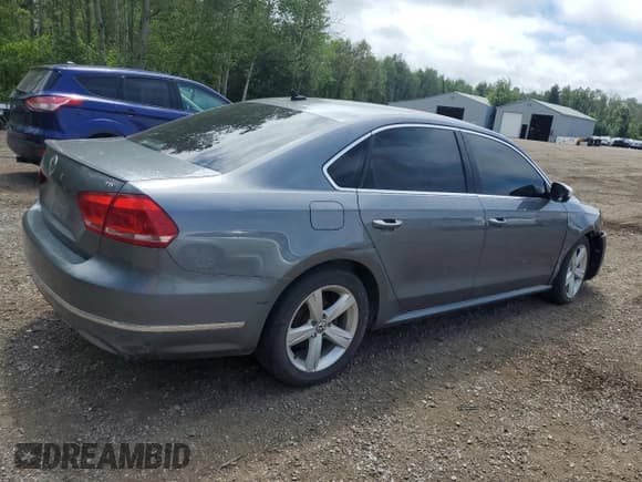 ✅ 2013 Volkswagen Passat SEL Premium • VIN: 1VWCN7A32DC149186 • Lot: 64565295. Listed on Copart with 217,590 mi. Free auction sales archive from the USA and detailed vehicle history report at DreamBid. Image 3.