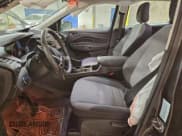 ✅ 2018 Ford Escape S • VIN: 1FMCU0F73JUB94261 • Lot: 95725975. Listed on Copart with 82,485 mi. Free auction sales archive from the USA and detailed vehicle history report at DreamBid. Image 7.