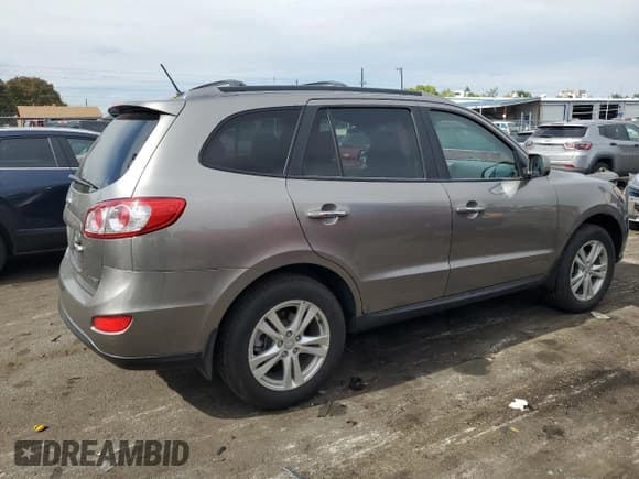 ✅ 2012 Hyundai Santa Fe Limited • VIN: 5XYZKDAG1CG113135 • Lot: 75273574. Listed on Copart with 66,860 mi. Free auction sales archive from the USA and detailed vehicle history report at DreamBid. Image 3.