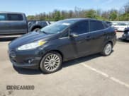 ✅ 2014 Ford Fiesta Titanium • VIN: 3FADP4CJ1EM239690 • Lot: 62091645. Wystawiony na Copart z przebiegiem 83 859 mil. Bezpłatny archiwum sprzedaży aukcyjnych z USA i szczegółowy raport historii pojazdu na DreamBid. Zdjęcie 1.