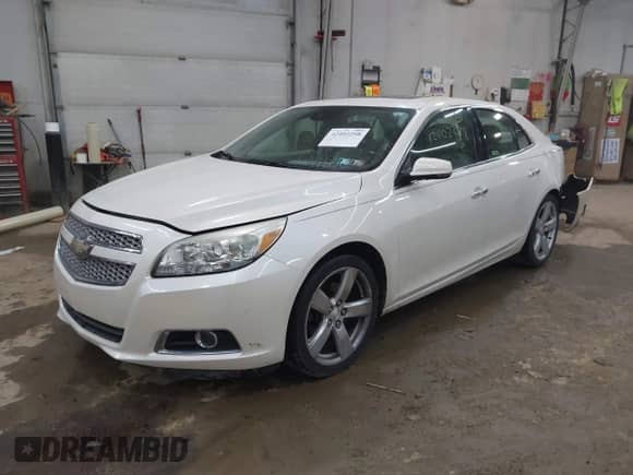 2013 Chevrolet Malibu LTZ with VIN 1G11J5SX2DF190629, listed as a IAAI auction lot 42402298 with 69,042 mi miles and . Bid and sale history available at DreamBid. Image 18.
