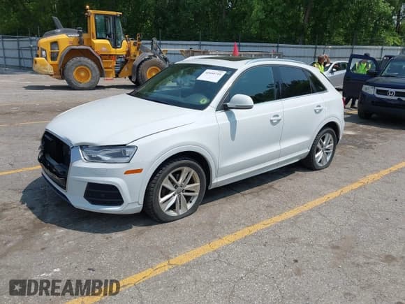 ✅ 2016 Audi Q3 Premium Plus • VIN: WA1EFCFSXGR014289 • Lot: 42440711. Listed on IAAI with 120,765 mi. Free auction sales archive from the USA and detailed vehicle history report at DreamBid. Image 2.