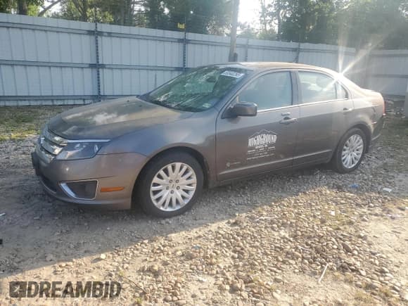 ✅ 2011 Ford Fusion Hybrid • VIN: 3FADP0L36BR264626 • Lot: 53340265. Listed on Copart with 174,902 mi. Free auction sales archive from the USA and detailed vehicle history report at DreamBid. Image 1.