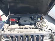 ✅ 2023 Jeep Wrangler Sahara • VIN: 1C4JJXP63PW672565 • Lot: 42831990. Listed on IAAI with 26,862 mi. Free auction sales archive from the USA and detailed vehicle history report at DreamBid. Image 10.