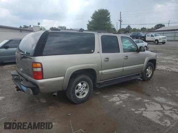 2001 Chevrolet Suburban LT с VIN 3GNFK16T51G261432, выставлен на аукционе Copart как лот 69691124 с пробегом 433 003 миль миль и На запчасти • Non repairable. История ставок и продаж доступна на DreamBid. Изображение 3.