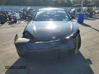 2007 Hyundai Tiburon GT с VIN KMHHN66F67U254717, выставлен на аукционе Copart как лот 71911505 с пробегом 162 144 миль миль и Списание • Salvage title. История ставок и продаж доступна на DreamBid. Изображение 5.