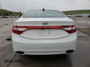 ✅ 2013 Hyundai Azera • VIN: KMHFH4JG6DA206540 • Лот: 59350095. Опубликован ранее на Copart с пробегом 65 579 миль. Бесплатный доступ к архиву аукционных продаж из США и подробный отчёт об истории автомобиля на DreamBid. Изображение 6.