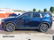 ✅ 2018 Mazda CX-5 Touring • VIN: JM3KFACM5J1473522 • Lot: 43315278. Listed on IAAI with 56,327 mi. Free auction sales archive from the USA and detailed vehicle history report at DreamBid. Image 14.