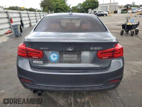 2018 BMW 3 Series 330i xDrive with VIN WBA8D9G57JNU70847, listed as a Copart auction lot 82004405 with 106,746 mi miles and Salvage title. Bid and sale history available at DreamBid. Image 6.
