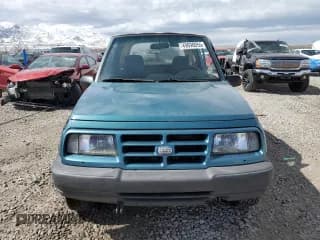 ✅ 1996 Chevrolet Tracker • VIN: 2CNBJ1869T6903615 • Лот: 49690055. Опубликован ранее на Copart с пробегом 144 821 миль. Бесплатный доступ к архиву аукционных продаж из США и подробный отчёт об истории автомобиля на DreamBid. Изображение 5.
