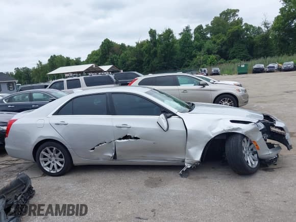 ✅ 2015 Cadillac CTS AWD • VIN: 1G6AW5SX3F0142431 • Lot: 43027413. Listed on IAAI with 125,276 mi. Free auction sales archive from the USA and detailed vehicle history report at DreamBid. Image 13.