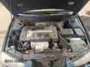 2003 Hyundai Elantra GLS z VIN KMHDN45D83U495806, wystawiony jako Copart lot #65962504 z przebiegiem 131 056 mil mil oraz Szkoda całkowita • Salvage title. Historia ofert i sprzedaży dostępna na DreamBid. Obrazek 11.