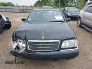 ✅ 1995 Mercedes-Benz C 2.8L • VIN: WDBHA28E7SF262334 • Лот: 42618540. Опубликован ранее на IAAI с пробегом 124 770 миль. Бесплатный доступ к архиву аукционных продаж из США и подробный отчёт об истории автомобиля на DreamBid. Изображение 12.