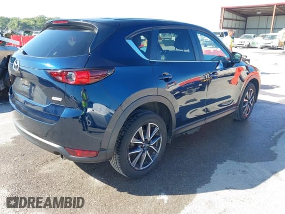 ✅ 2018 Mazda CX-5 Touring • VIN: JM3KFACM5J1473522 • Lot: 43315278. Listed on IAAI with 56,327 mi. Free auction sales archive from the USA and detailed vehicle history report at DreamBid. Image 4.