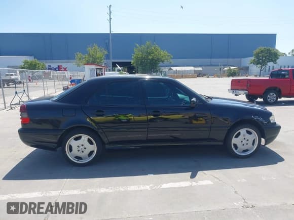✅ 1999 Mercedes-Benz C • VIN: WDBHA33G3XF889442 • Lot: 42403800. Listed on IAAI with 82,075 mi. Free auction sales archive from the USA and detailed vehicle history report at DreamBid. Image 13.