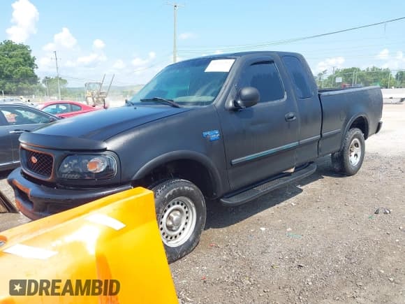 ✅ 1998 Ford F-150 • VIN: 1FTRX18L2WKA67414 • Lot: 42583873. Listed on IAAI with 189,546 mi. Free auction sales archive from the USA and detailed vehicle history report at DreamBid. Image 2.