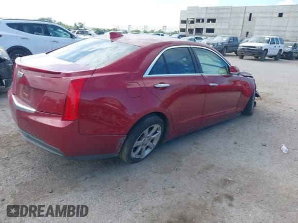 ✅ 2015 Cadillac ATS Luxury RWD • VIN: 1G6AB5RA2F0121860 • Lot: 42574138. Listed on IAAI with 69,548 mi. Free auction sales archive from the USA and detailed vehicle history report at DreamBid. Image 4.